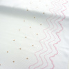 Miniatura de foto de Volante piqué blanco bordado lunares camel y ondas rosas