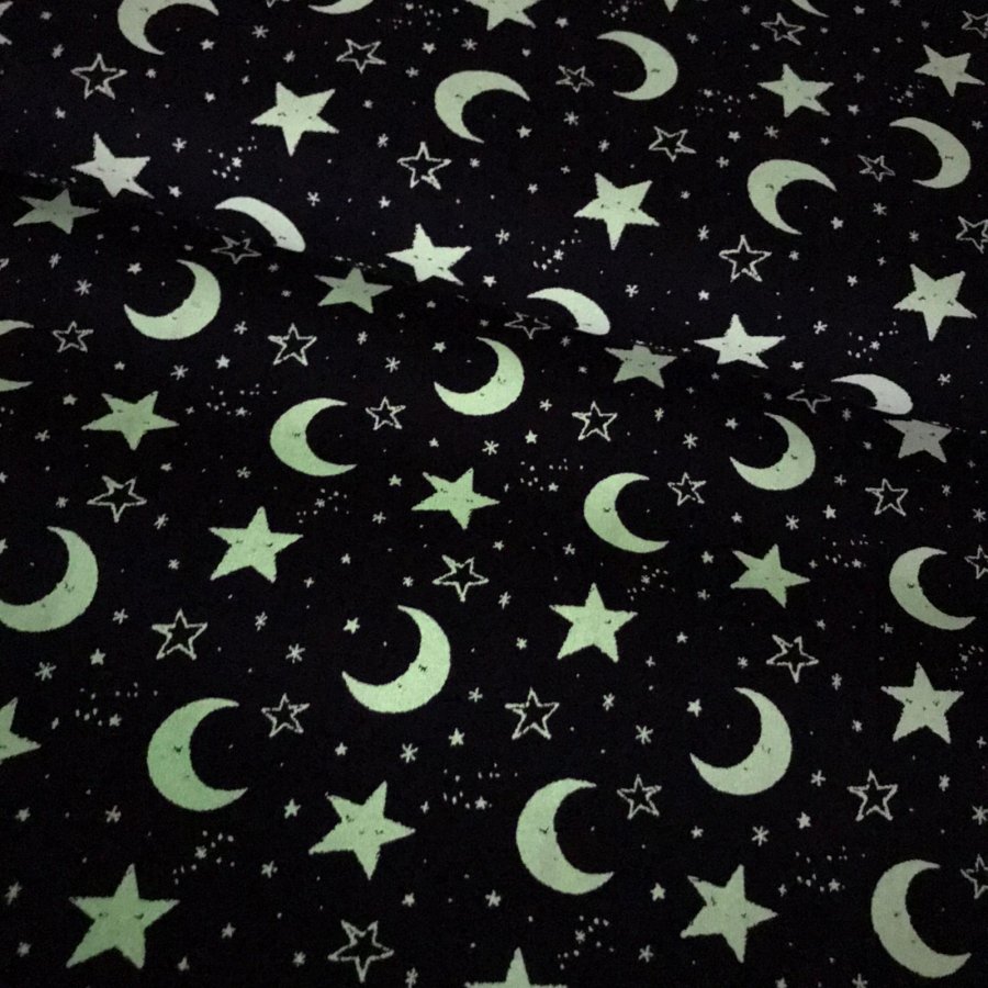 Foto de Popelín estampado fosforescente estrellas y lunas